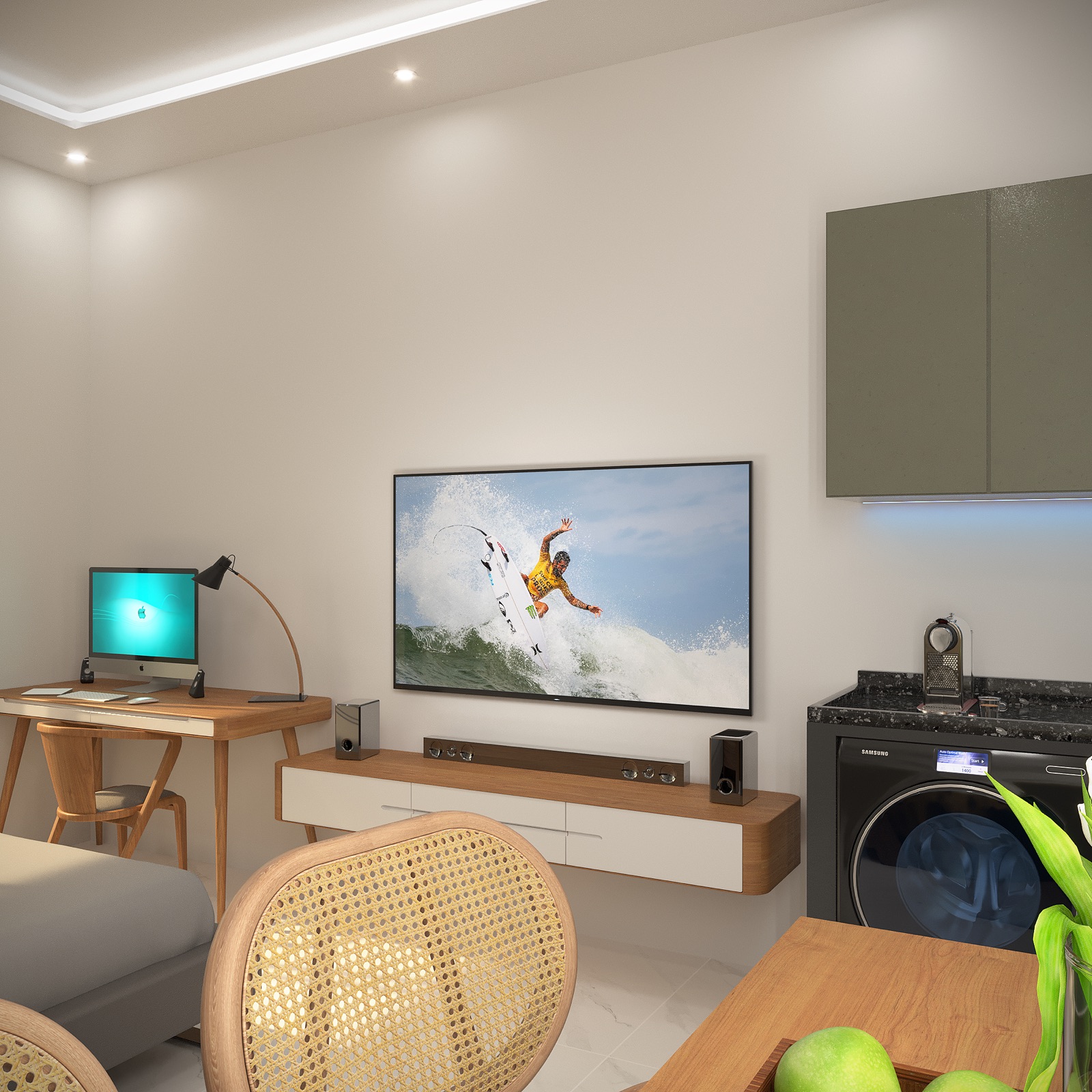 Sala do studio com TV e mesa de trabalho